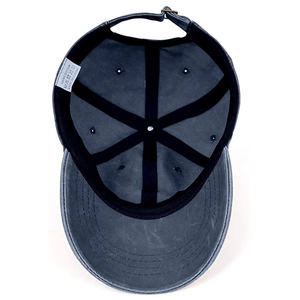 Detail view of cotton baseball cap interior showing 100% cotton label and stitching