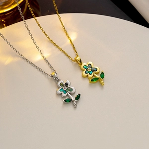 Titanium steel necklaces with flower pendants in gold and silver featuring abalone shell