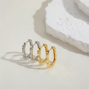 Square zircon hoop earrings in gold and silver finish with studded texture