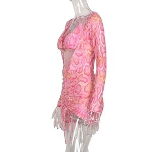 Detail of pink snakeskin print dress with ruched drawstring and hollow out design