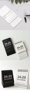 Detailed view of 2024-2025 desktop calendar with twin-wire binding and TO-DO LIST