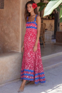 Detail of red and white print maxi dress with blue scalloped embroidery on straps