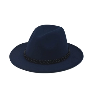 Detail of navy blue felt fedora hat featuring a stylish black woven chain band decoration