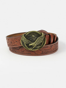 Close-up of vintage brown leather belt with embossed patterns and bronze eagle buckle
