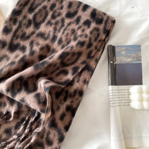 Elegant leopard print cashmere-style winter scarf with soft brown and black pattern