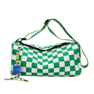 Minimalist green checkerboard canvas crossbody bag with adjustable strap and zip closure