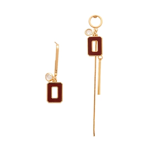 Vintage asymmetric gold earrings with dark red rectangular pendants and crystal fringe
