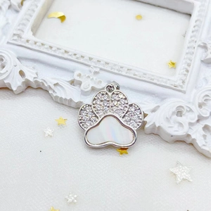 Silver cat paw pendant with white mother of pearl and cubic zirconia stones