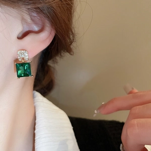 Elegant emerald green square crystal earrings with pavé diamonds in gold setting