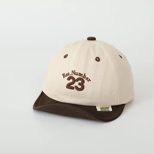 Close-up of Number 23 embroidery on the contrast color kids baseball cap with soft brim