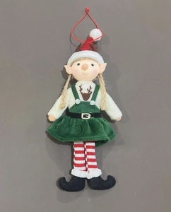 Detail of Christmas elf girl plush ornament with green overall dress and red white striped socks