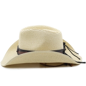 Detail of cream straw cowboy hat with textured weave and brown faux leather tassel band