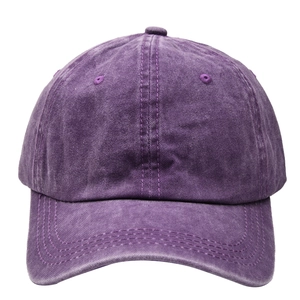 Detailed shot of vintage washed purple cotton baseball cap with fine stitching texture