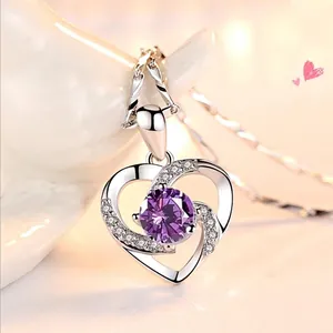 Silver heart pendant necklace with purple gemstone and crystals for women