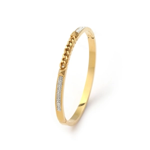 Detail of a gold-tone butterfly bangle featuring chain texture and rhinestone inlay crystals