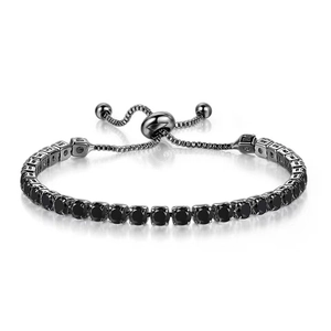 Detail of adjustable black crystal tennis bracelet with a sliding clasp and reflections