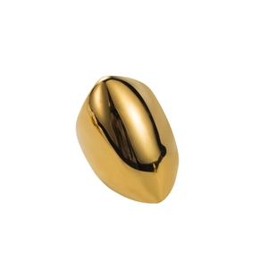 Macro detail of the smooth gold bean pendant featuring high polished metallic luster