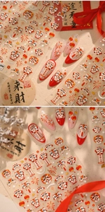 Detail of Chinese New Year nail stickers with lion dance and festive lantern motifs