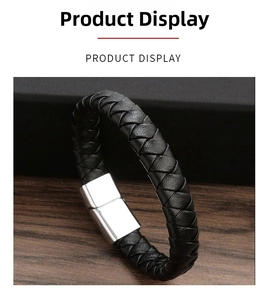 Detail shot of the braided black leather strap and square silver magnetic clasp