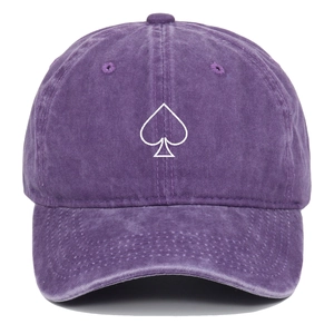 Vintage washed purple cotton baseball cap with white spade embroidery on plain background