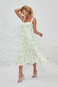 Detail of the white and green floral print on this side-slit summer cami dress