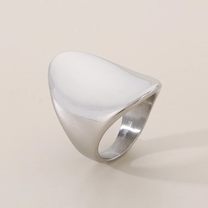 Macro view of wide silver titanium steel ring with smooth polished oval surface