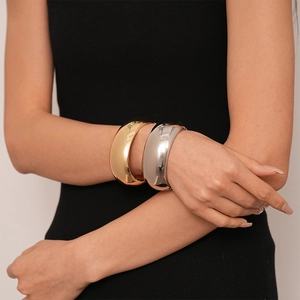 Minimalist wide chunky metal open cuff bracelets in polished gold and silver finish