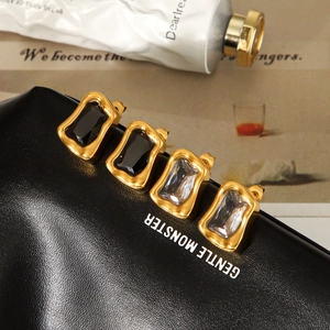 Boucles d'oreilles de luxe en acier inoxydable doré avec zircons noirs et transparents