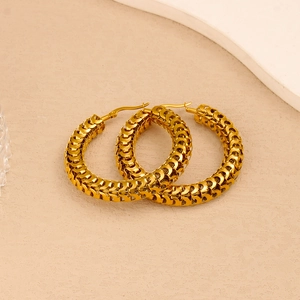 Macro shot of 18K gold plated thick hoop earrings with textured chain link design