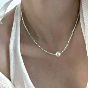 Elegant S925 sterling silver beaded necklace featuring a central white pearl pendant