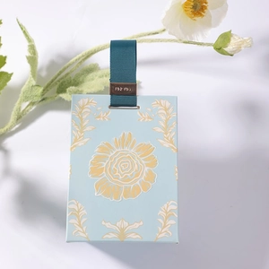 Elegant light blue floral wedding candy box with sunflower print and green ribbon handle