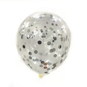 Detailed view of clear latex balloon filled with shiny silver and grey confetti sequins