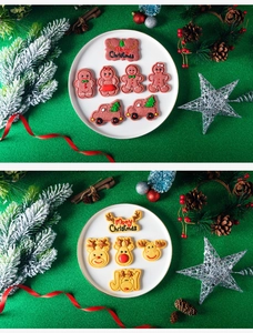 Detailed view of festive Christmas cookies including gingerbread men and reindeer shapes