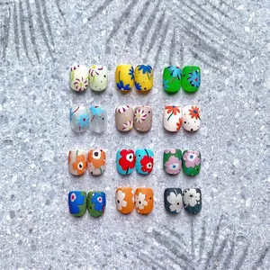 Floral press-on nail set with matte and glossy finish in assorted summer colors