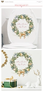 Detailed view of Christmas pine wreath wall stickers with festive holiday greetings