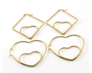 Detailed view of 18K gold plated stainless steel heart earrings and geometric square studs