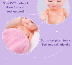 Detail of safe PVC baby doll and soft short plush fabric materials for children