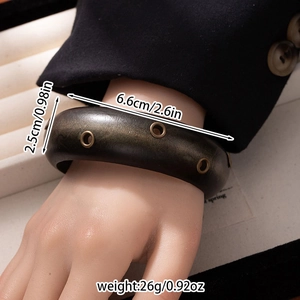 Detailed size chart for retro wide wood bracelet with metal eyelets and dimensions
