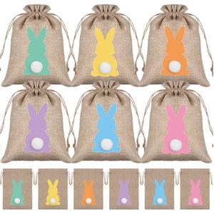 Burlap Easter bunny gift bags with colorful rabbit silhouettes and 3D pom-pom tails
