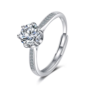 Elegant six-prong solitaire ring with side stones and adjustable V-shaped band