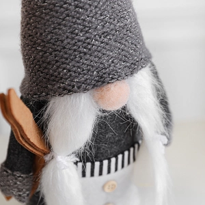 Handcrafted Christmas gnome doll with grey knit hat and white braided beard holiday decor