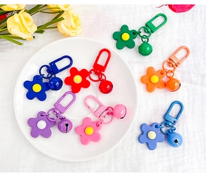 Colorful floral bell keychains with lobster clasps in seven bright vibrant colors