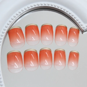 Short square gradient orange press-on nails with metallic gold French tips 24pcs set
