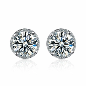 Close-up of sparkling 2-carat round cubic zirconia stud earrings with halo setting