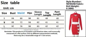Size chart for rhinestone heart crop top and skirt set showing knit fabric measurements