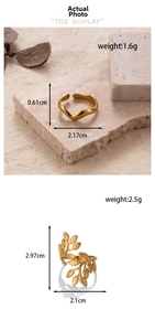 Detail of gold olive leaf and wavy adjustable open rings with measurements and textures