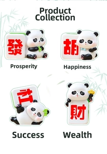 Detail shot of resin panda figurines featuring traditional Chinese mahjong characters
