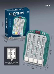 Detailed view of green rhythm game machine dimensions and AAA battery compartment