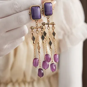 Vintage style purple gemstone tassel earrings with gold-toned antique finish for women