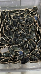 Bulk lot of faceted oval dark green crystal pendants with gold plated double loop connectors